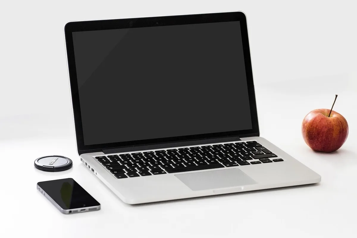 Phone playing short vertical video on a creative desk with storyboards